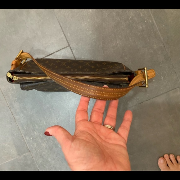 Authentic Louis Vuitton VivaCite GM - Picture 14 of 15